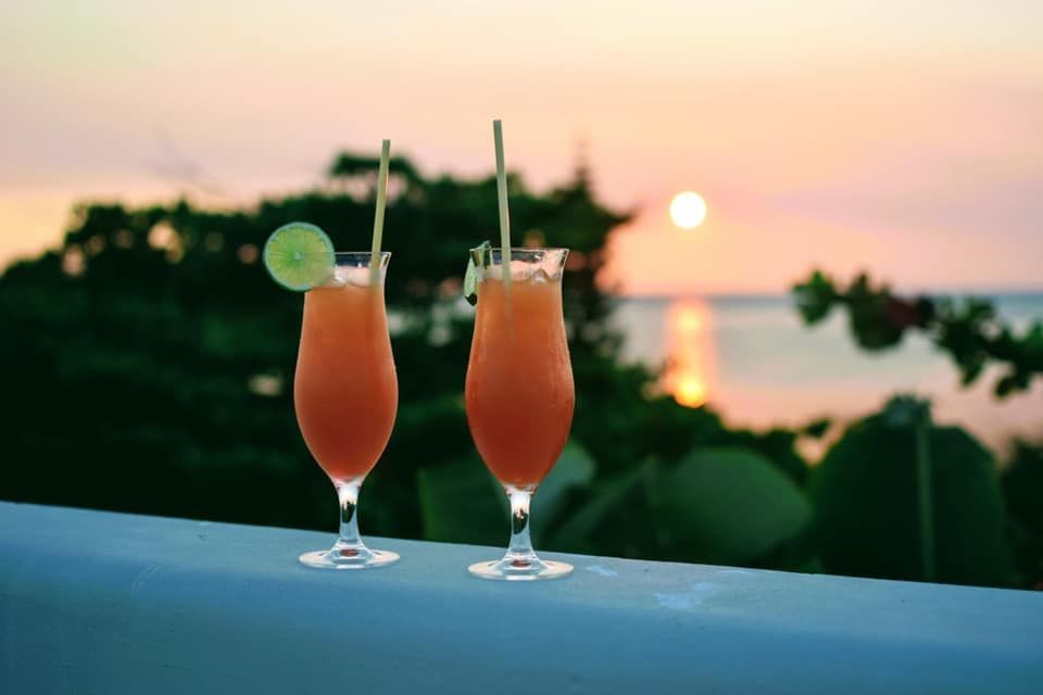 Drinks-overlooking-the-Sea---St.-Georges-Caye-Resort---Belize